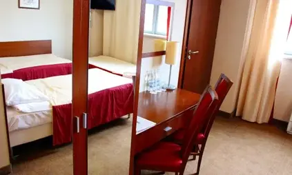 Chambre avec lit supplémentaire